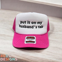 Load image into Gallery viewer, Put It On My Husband's Tab Embroidered Trucker Hat