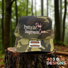Load image into Gallery viewer, Pretty in Pink Dangerous In Camo Embroidered Trucker Hat
