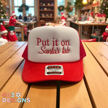 Load image into Gallery viewer, Put It On Santa&#39;s Tab Embroidered Foam Trucker Hat
