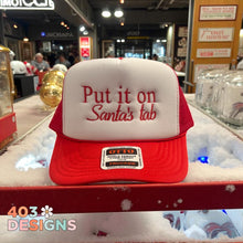 Load image into Gallery viewer, Put It On Santa&#39;s Tab Embroidered Foam Trucker Hat
